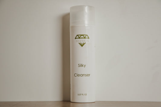 A pump bottle with a white and green color scheme.